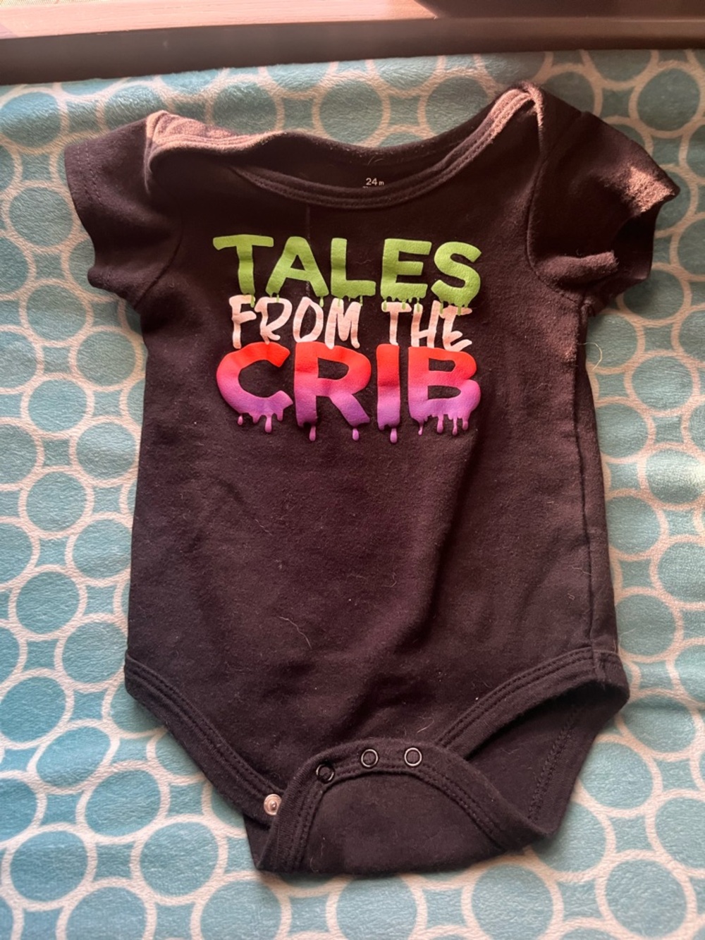 Kids Black One-Piece Bodysuit with Colorful "Tales From The Crib" Graphic